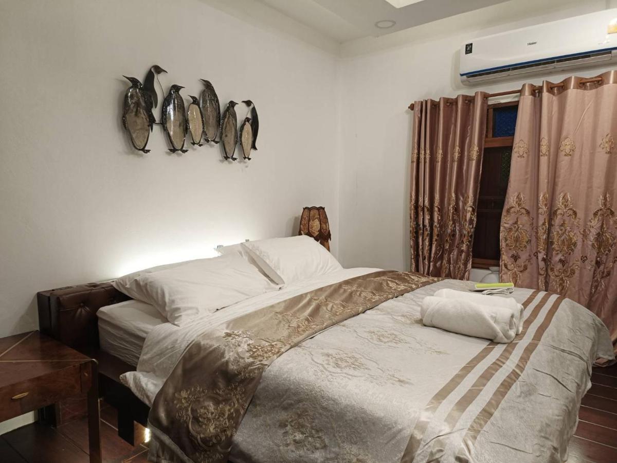 Tasana Garden Saraphi ทาซาน่าการ์เด้น สาขาสารภี Séjour chez l'habitant *