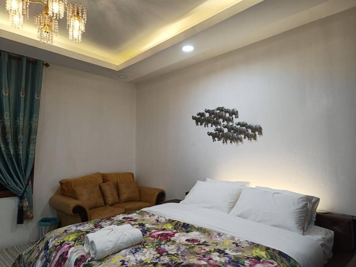 Tasana Garden Saraphi ทาซาน่าการ์เด้น สาขาสารภี Séjour chez l'habitant