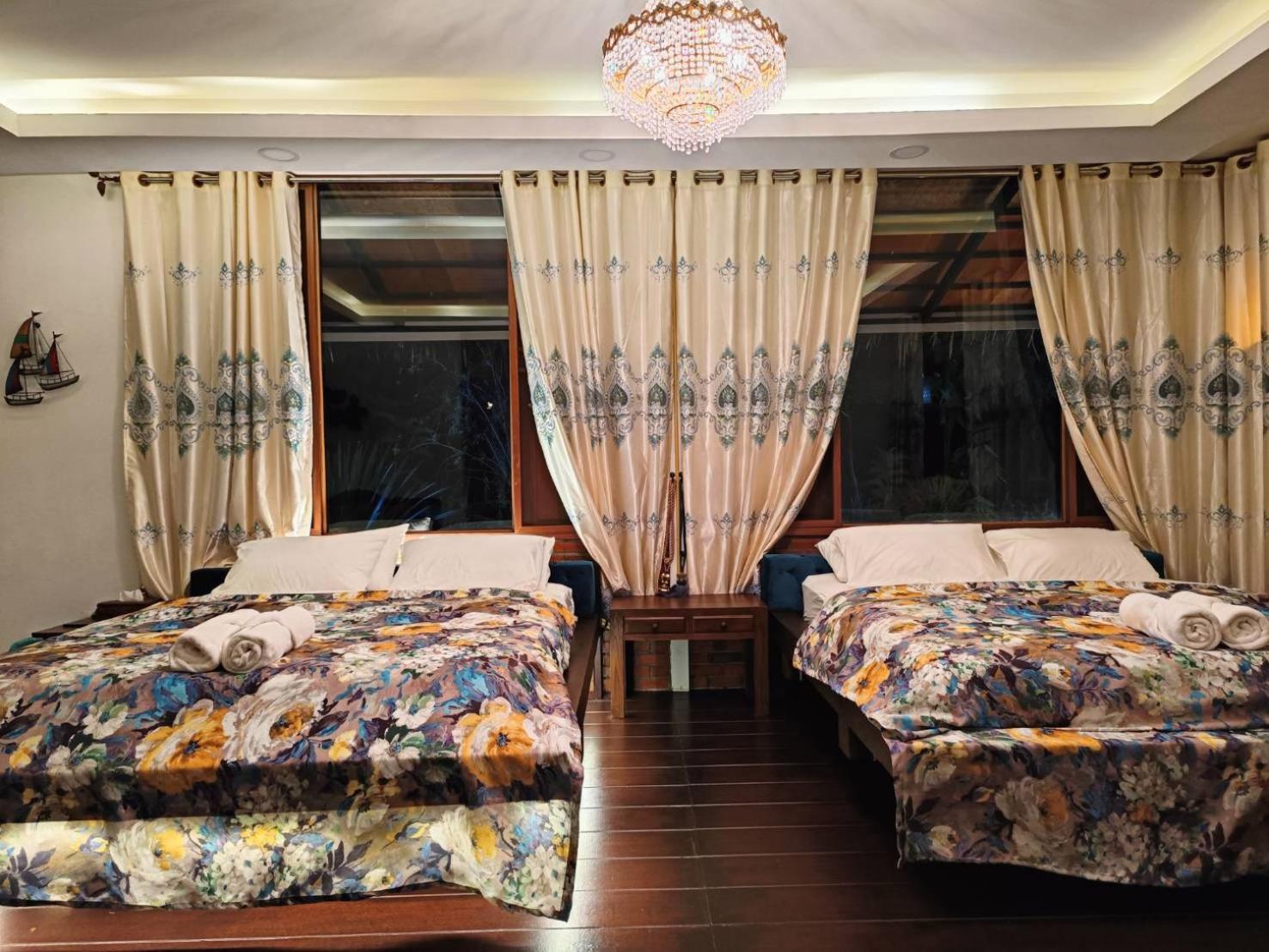 Tasana Garden Saraphi ทาซาน่าการ์เด้น สาขาสารภี Séjour chez l'habitant *